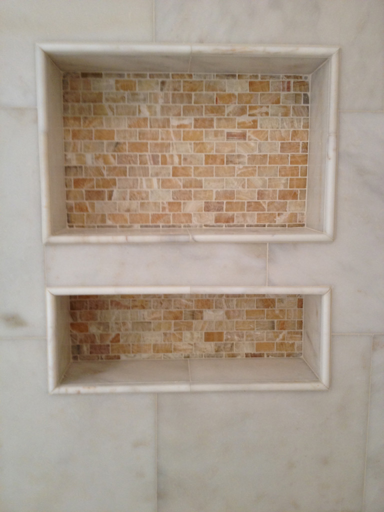 Bathroom addition on a home with brick siding built by Action Builders in Mt. Lebanon