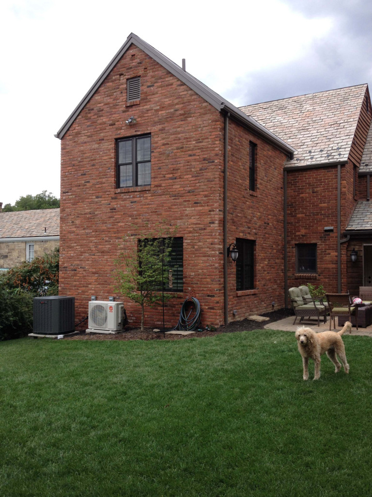 Bathroom addition on a home with brick siding built by Action Builders in Mt. Lebanon