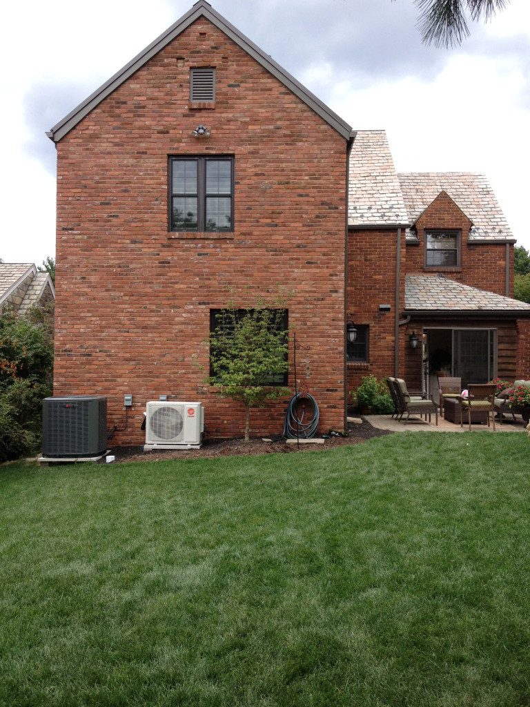 Bathroom addition on a home with brick siding built by Action Builders in Mt. Lebanon